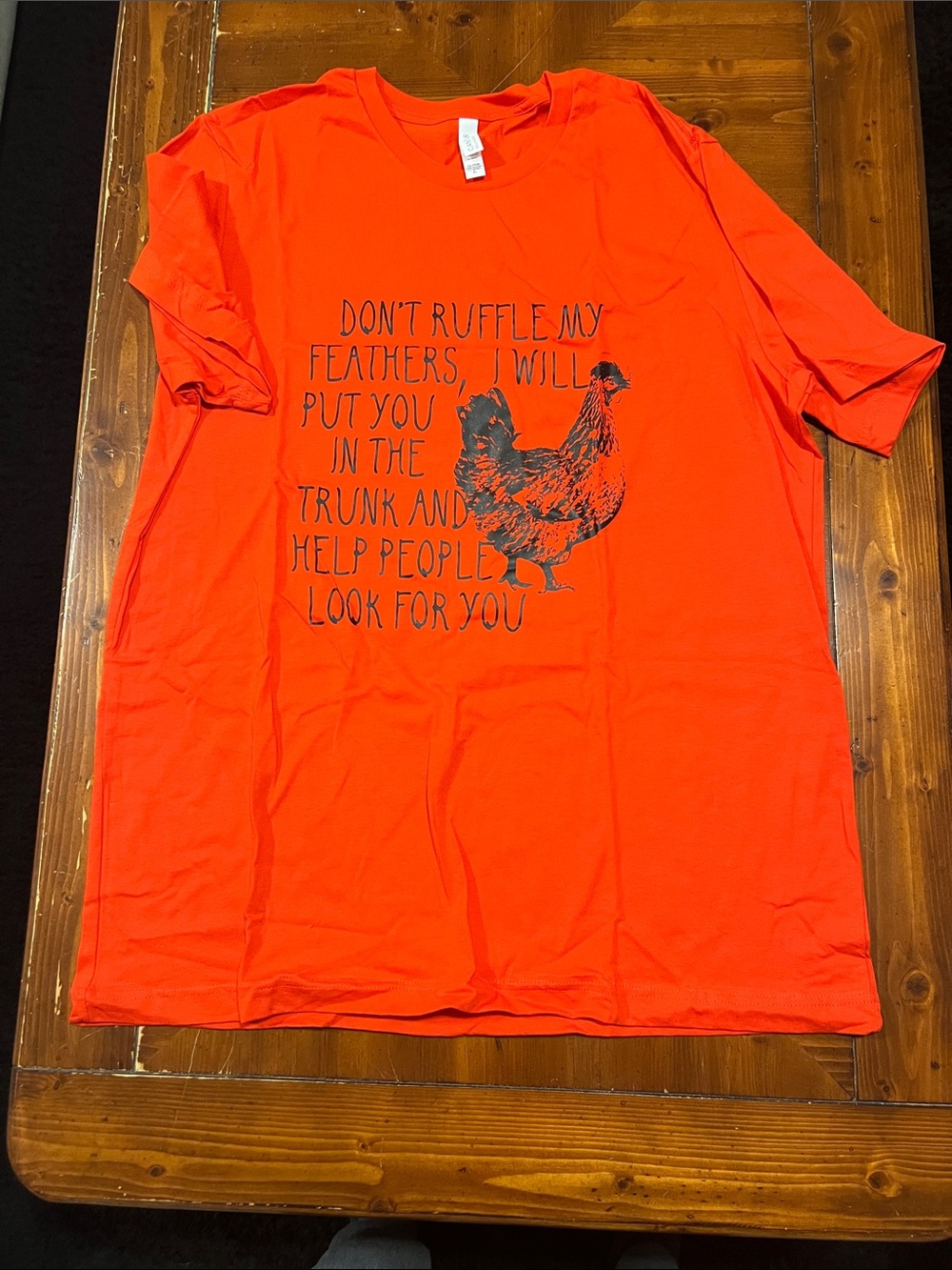 Men's Orange Graphic Tee with Hen Design
